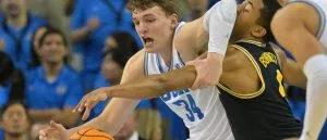 College Basketball Odds, Picks, Predictions Today: Will UCLA Rebound Against Iowa?