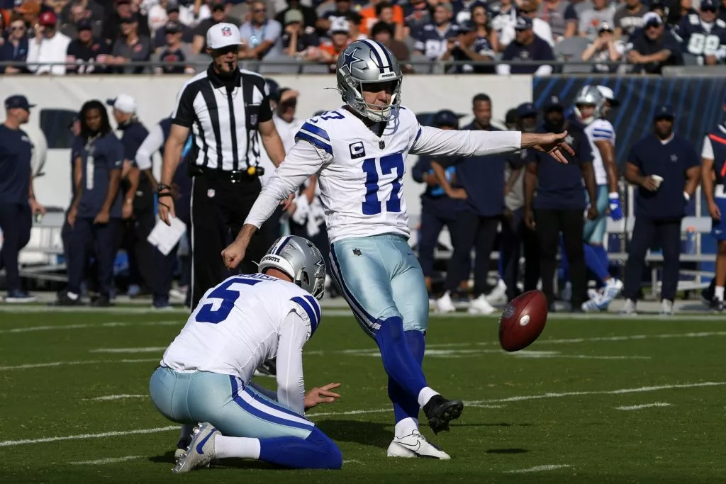 Sep 21, 2025; Chicago, Illinois, USA; Dallas Cowboys kicker Brandon Aubrey (17) kicks a field goal against the Chicago Bears during the first half at Soldier Field. Mandatory Credit: David Banks-Imagn Images