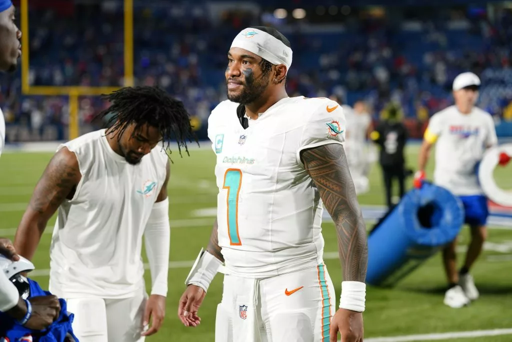 Sep 18, 2025; Orchard Park, New York, USA; Miami Dolphins quarterback Tua Tagovailoa (1) looks on after the game against the Buffalo Bills at Highmark Stadium. Mandatory Credit: Gregory Fisher-Imagn Images