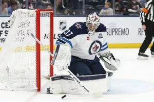 Connor Hellebuyck Dealt to Devils