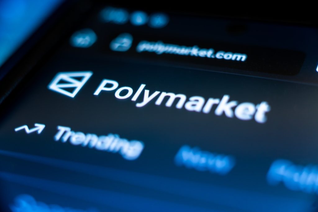 Polymarket prediction exchange mobile app screen. Polymarket drops sports event contracts in Michigan.